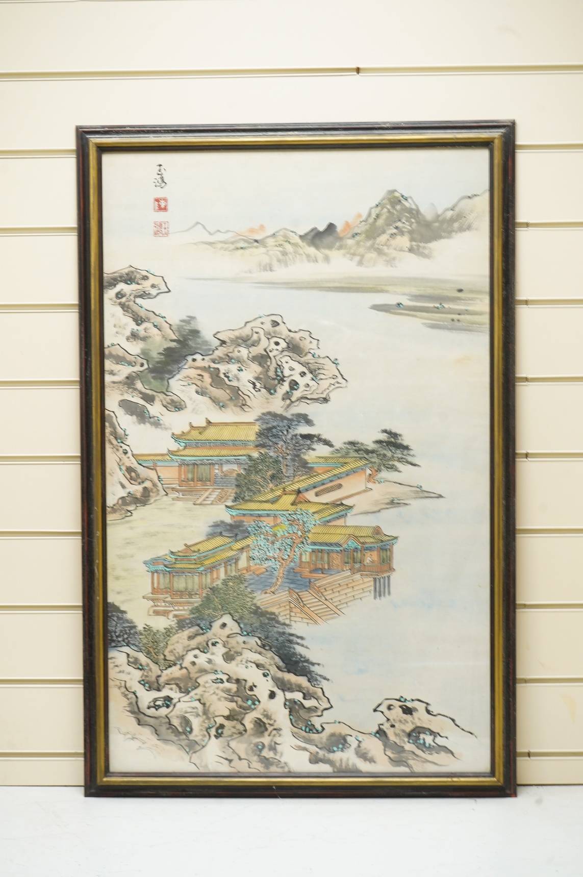 Chinese School, 20th century, Riverscape with pagodas, signed with character marks and red seal marks, ink and watercolour, 81 x 49cm